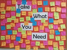 a bulletin board with post - it notes and the words take what you need written on it