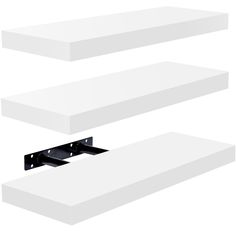 three white shelves with black brackets on them