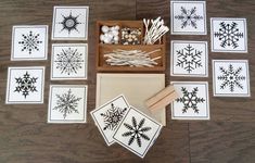 several snowflakes are shown on the floor with some rubber stamping and glue