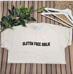 Gluten Free Girlie Tee This t-shirt will make a perfect gift for a birthday, Christmas, or any other occasion. Please note that these t-shirts are a loose fit. Any questions just ask! If you like my products please favourite my shop, so you can stay up to date on my latest products and projects.  You can also find us on these... https://www.instagram.com/simithecoeliac/ Cute Text Print T-shirt As Gift, Cute Crew Neck T-shirt With Custom Text, Cute Custom Text Cotton T-shirt, Cute Slogan T-shirt For Gifts, Cute T-shirt With Custom Text For Gift, Cute Slogan T-shirt For Gift, Cute Tops With Custom Text For Gift, Cute Top With Custom Text For Gift, Cute Custom Text T-shirt For Gift