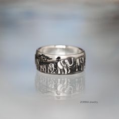 "Ring \"Seven Elephants\" - a must for good luck Patina (blackening) Hand Carving with Model Wax" Symbolic Rings With Unique Design For Gift, Symbolic Carved Engraved Ring As Gift, Symbolic Engraved Carved Ring As Gift, Symbolic Engraved Carved Ring For Gift, Unique Carved Rings As Gifts, Unique Carved Rings For Gifts, Unique Handmade Engraved Ring As A Gift, Unique Engraved Ring For Gift, Unique Engraved Round Ring As Gift