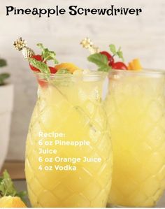 two glasses filled with pineapple and orange juice