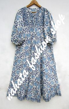 ITEM DESCRIPTION coolest blue flower look maxi dress - Henley neckline with button maxi dress - 3/4th sleeve with button maxi dress  Features: 3/4thsleeve, Henley neck, Long dress Material: Cotton cambric Fabric: 100% cotton soft light weight ethnic print fabrics  Sleeve Length = 18 inch For more sizes & their measurement, please refer our below chart to understand the sizes variations available with us For your size requirement, please mention your size in seller note at the time of buying. SIZ Blue Bohemian Half Sleeve Maxi Dress, Blue Half-sleeve Maxi Dress For Vacation, Light Blue Floral Print Maxi Dress, Fitted Half Sleeve Blue Maxi Dress, Blue Fitted Half Sleeve Maxi Dress, Blue Fitted Maxi Dress With Half Sleeves, Blue Cotton Maxi Dress With 3/4 Sleeves, Blue Half-sleeve Midi Dress For Summer, Blue Bohemian Maxi Dress With 3/4 Sleeve