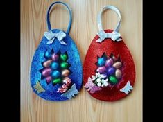 two small bags decorated with flowers and butterflies