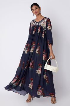 Dark blue maxi with all over printed floral motifs.
Component: 1
Embroidery
Neckine: V neck
Sleeve Length: Three fourth
Fabric: Bemberg Crepe
Color: Blue
Hand embroidered floral motifs on neckline
Gather detail - Aza Fashions Maxi Dress Indian, Zardosi Embroidery, Maxi Dress Designs, Maxi Dress For Women, Kurta Dress, Embroidered Maxi Dress, Maxi Dress Online, Blue Maxi, Saree Dress