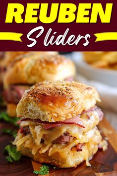 two sandwiches stacked on top of each other with the words reuben sliders above them