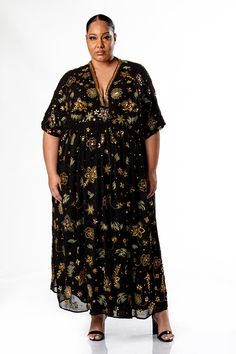 Dive fully into the floral trend with the Any Old Iron Full Floral Gown! This unique, one-size-fits-most, black dress is completely adorned with golden rhinestones, beadwork, and embroidery that brings to life a garden fit for royalty, even King Midas. Each hand-adorned detail is applied to compose a wide array of flowers and foliage. The neckline of the dress features rows of gold sequins that descend into a deep v, which draws the eye to the tiniest part of your figure and accentuates the leng Bohemian Floor-length Dresses With Gold Embroidery, Bohemian Maxi Dress With Gold Embroidery, Bohemian Gold Floor-length Dress, Festive Bohemian Black Maxi Dress, Black Sequined Dresses For Festivals, Black Sequined Dress For Festival, Black Sequin Festival Dress, Festive Embellished V-neck Maxi Dress, Bohemian Embellished Maxi Dress For Festive Season