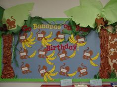 a bulletin board with monkeys and bananas on it