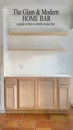 the glam & modern home bar is on display in an empty room with tile flooring