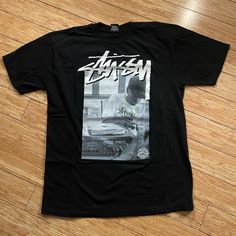 - Rare And Long Out Of Print Black Stussy X Stones Throw Collab Shirt Dedicated To The Late Great J Dilla - Size Adult Men's Large (Please Read Measurements Below Before Purchasing) - No Tags But Never Even Worn, Mint Shape. A True Gem For The J Dilla Or Stussy Collectors 21" Top Of Shoulder Seam To Shoulder Seam 29" Top Of Collar To Bottom For Fans Of: Jaylib Mf Doom Detroit Quasimoto Illa J Madvillain Peanut Butter Wolf Pete Rock King Geedorah A Tribe Called Quest Roots Erykah Badu Common De La Soul 9th Wonder Little Brother Pharcyde *** For Mutual Protection, I Video Record The Process Of Wrapping, Packaging/Boxing, Recording The Weight & Shipping Labels At Shipping Store For All It King Geedorah, Slum Village, 9th Wonder, Pete Rock, J Dilla, A Tribe Called Quest, Tribe Called Quest, Mf Doom, Erykah Badu