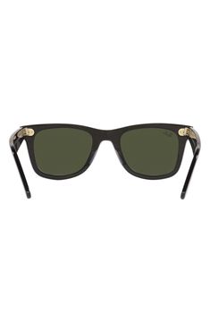 Logo-embellished temples provide a polished finish for throwback sunglasses that are sure to elevate any look. 50mm lens width; 22mm bridge width; 150mm temple length 100% UV protection Prescription-compatible Acetate/crystal Made in Italy Wayfarer Shield Sunglasses With Tinted Lenses, Classic Green Wayfarer Sunglasses, Dark Green Sunglasses, Green Wayfarer Sunglasses With Mirrored Lenses, Vintage Green Wayfarer Sunglasses, Green Square Frame Anti-reflective Sunglasses, Uv Protection, Square Sunglasses, Dark Green