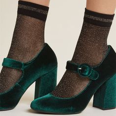 Elevate your style with these vintage-inspired green velvet Mary Jane pumps. Featuring a comfortable block heel, they add a touch of sophistication to any outfit. Color: Green Material: Velvet Heel Type: Block heel Heel height: 4" / 100 mm approx Product measurements were taken using size 8. Please note that measurements may vary by size. Toe: Closed toe Handcrafted US sizing. Fits true to size. Metallic Socks, Knee High Stiletto Boots, Velvet Block Heels, Dr Shoes, Estilo Hippie, Velvet Heels, Pumps Heels Stilettos, Stiletto Boots, Mode Casual