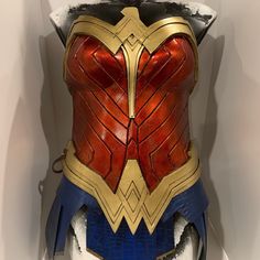 a close up of a costume made to look like wonder woman's chest armor