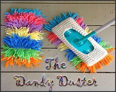 a colorful mop sitting on top of a wooden floor next to the words the dandy duster