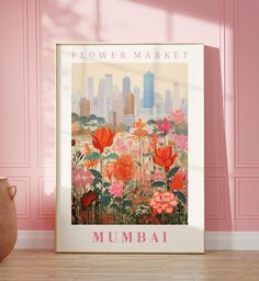 a pink room with a poster on the wall that says flower market mumbai in front of it