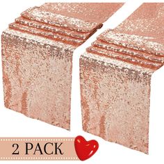 two packs of rose gold sequinized table runners with hearts on each side