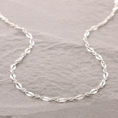 "Solid, quality sterling silver double mirror chain necklace. Matching chain extender is available - add 1.5\"-4\" instantly to suit your fashion of the day or for a layering style. { WHAT LENGTH IS RIGHT FOR ME? } * You can look at the length guide photo, but this is just a general guideline. The best way is to wrap a string, phone charging wire, etc. around your neck, and find the length you like. Then, measure that with a tape measure or ruler. * The lengths shown in the pull-down are from en Silver Chains For Women Simple, Dainty Silver Oval Link Necklace, Silver Chain Necklace With Delicate Oval Link, Silver Jewelry With Delicate Oval Link Chain, Silver Chains For Women, Layering Style, Pendant Bail, Double Mirror, Necklace Matching