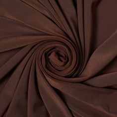 a close up shot of the fabric in dark brown color, which is very soft