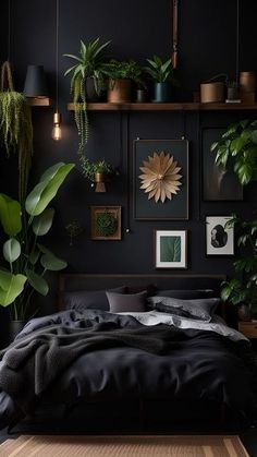 a bedroom with black walls and lots of plants