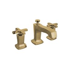 two gold faucets on a white background