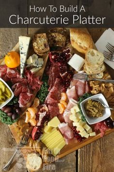 the cover of how to build a charcuterie platter with meats and cheeses