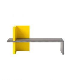 a yellow bench sitting on top of a white floor next to a metal shelf with an open end