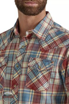 Wrangler 112346601 Red & Blue Plaid Retro Premium Shirt Look good while feeling good in the men's Wrangler Retro® long-sleeve western snap printed shirt. This contemporary take on the classic style you love comes packed with all the distinctive details, including pointed front and back yokes, single-needle stitching at the placket, modern fit, contrast trim, two snap cuffs, and two chest flap pockets with snaps. This long-sleeve snap shirt features a modern fit and it's crafted from cotton for c Retro Jeans, Retro Men, Mens Plaid, Feeling Good, Check Shirt, Western Shirts, Contrast Trim, Red Plaid, Blue Plaid