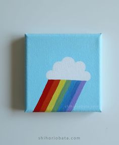 a painting of a rainbow in the sky with clouds on it's back side