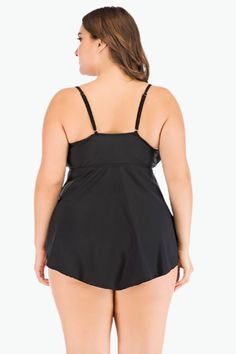 The Black Ruched Two Piece Tankini Plus Size Swimsuit is all you need to get through summer in style! Our plus size swimwear from Curvy Waves offer comfort and style combining with sexy prints and curve-hugging fit. With bold patterns that shout "summer's here" and sizes that go up to a 6XL, there's nowhere else to go bikini shopping for! Instantly lengthen the look of your legs with the high-cut hemline! Our tankinis are designed to make sure they fit you right. And by right, we mean no tummy r Black Swim Dress With Built-in Bra For Pool, Vacation Swim Dress With Built-in Underwire Bra, Black Swim Dress With Built-in Bra For Beach Season, Black One-piece Tankini For Pool, Black Lined Tankini For Pool, Black Ruched Swimwear For Pool, Black V-neck Tankini For Swimming, Black Ruched One-piece Swimwear, Black Beachwear Swim Dress For Pool