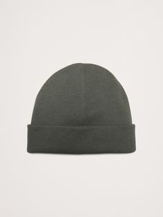 This cotton beanie is made from soft, organic cotton with a beautiful rib stitch texture, crafted for a modern, fisherman-hat style fit that sits higher on the head than the average beanie.  Organic: Made with certified, organically grown cotton that's easier on the earth.  Length (flat): 7. 5" Ribbed Beanie Hat, Classic Beanie With Ribbed Cuffs, Solid Ribbed Beanie Hat, Solid Color Ribbed Beanie Hat, Warm Cotton Beanie Bonnet, Warm Cotton Beanie, One Size, Warm Cotton Beanie One Size, Warm Cotton Beanie One Size Fits Most, Adjustable Cotton Beanie