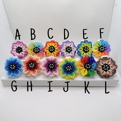 the letters and numbers are made out of crochet flowers