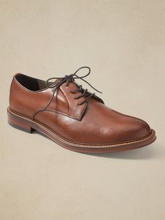 A versatile oxford shoe with sleek, minimalist design, made in luxe, Italian leather.  Designed with lightweight, durable OrthoLite® performance insoles for breathable cushioning that wicks away moisture for the ultimate in comfort.  Our Advanced Co Leather Slip-resistant Dress Shoes With Round Toe, Slip-on Oxfords For Derby, Business Slip-on Oxfords With Ortholite Insole, Classic Lace-up Shoes With Ortholite Insole, Slip-resistant Leather Dress Shoes With Round Toe, Formal Low-top Dress Shoes With Ortholite Insole, Formal Dress Shoes With Ortholite Insole, Classic Brown Oxfords With Ortholite Insole, Classic Slip-resistant Plain Toe Oxfords