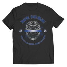 a black t - shirt with the words back the blue and an image of a police badge