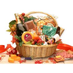 This honey willow basket brings the Thanksgiving Gourmet gift basket. From sparkling apple cider to cheese, summer sausage, rye bread and sweets treats to satisfy the most discriminating palate, this gift will please your friends and family this Thanksgiving season. Send the Thanksgiving Gourmet gift basket to someone you love today. This gift includes: Sparkling Apple Cider, Wisconsin Cheddar Cheese Round, 5 oz. Summer Sausage, 2.25 oz. Grained Mustard, Focaccia Parmesan Crackers, Gourmet Coffee, 2 oz. Cheddar Cheese Popcorn, Tavolare Snack Mix, 4.2 oz. Dolcetto Chocolate Cream Filled Pastry Cookie, Caramel nut clusters, and Honey Willow Basket. Disclaimer: *All contents subject to change based on availability at time of purchase. Any and all substitutions will maintain the monetary value Thanksgiving Gourmet, Gourmet Thanksgiving, Thanksgiving Gift Basket, Cheese Gift Baskets, Sparkling Apple Cider, Thanksgiving Baskets, Gourmet Meat, Fall Gift Baskets, Thanksgiving Sweet Treats