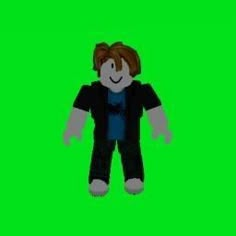 a green screen image of a doll with brown hair and blue shirt, standing in front of a green background