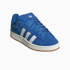 Campus 00s ShoesClassic shoes with a 2000s skate-inspired look.Step out in style in these adidas Campus 00s Shoes. Heavily influenced by the 2000s skate era, these shoes take the iconic look of the classic Campus 80s and update it with bold new proportions. The suede and leather upper pairs with a gum rubber outsole for instantly recognisable heritage style. Contemporary touches come in the form of oversized 3-Stripes and wide printed laces. A perfect blend of old and new, these shoes make a sta