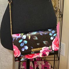 Betsey Johnson Crossbody Bag Featuring A Vibrant Floral Print, Gold Chain Strap With Wallet Inside. Condition: New Color: Black With Multicolor Floral Design Chic Pink Clutch With Chain Strap, Elegant Floral Print Crossbody Shoulder Bag, Chic Floral Print Crossbody Shoulder Bag, Chic Multicolor Clutch With Chain Strap, Elegant Party Bag With Floral Print, Chic Evening Bags With Floral Print, Bag With Chain, Betsey Johnson Bags, Chain Strap