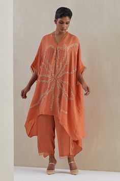 Orange kaftan hand embroidered with flower motif, handkerchief hem and sheer scalloped border detailing. Paired with a flared pant with matching sheer border on hem and contrasting line on sides. - Aza Fashions Orange Kaftan, Hand Embroidered Flower, Kaftan Designs, Scalloped Border, Drape Dress, Kimono Fabric, Flower Motif, Handkerchief Hem, Draped Dress