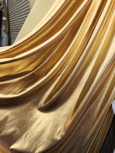 "This is a gorgeous and extremely soft 4 way stretch metalic Gold pleather w gold backing 60\"w Fabric by the yard - This product is sold per yard. - Buy as many yards as you need. - Contact us if you need more or you need a customize order. - We offer samples too. Ask us - If you are interested in buying at least 40 yards of one fabric, we are glad to offer special bulk and wholesale pricing. Please contact us with the fabric you are interested in and we will work with you to get the best deal. Garden Gala, Gold Drapes, Iphone Wallpaper Texture, Grow Garden, Silver Falls, Golden Rules, Sleek Dress, Dancers Outfit, Product Shoot