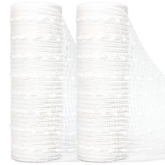 two rolls of white tissue sitting next to each other