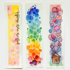 three watercolor bookmarks with different designs and words on them, one has a house and the other has balloons