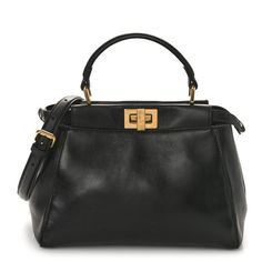 This is an authentic FENDI Nappa Mini Peekaboo Iconic Satchel in Black. This stylish handbag is crafted of soft nappa lambskin leather in black. It features a leather top handle, an optional crossbody strap, and gold Fendi logo turn locks. This opens to a partitioned black leather interior with pockets. Fendi Crossbody Bag, Fendi Peekaboo Bag, Pokemon Fabric, Fendi Shoulder Bag, Fendi Peekaboo, Fendi Logo, Phone Pouch, Boston Bag, Shopper Tote