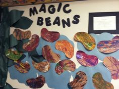 a bulletin board with different types of rocks and writing on it that says magic beans