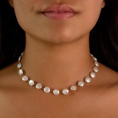 Please allow 4 - 6 weeks for production and delivery if this item is not currently in stock. Description:  Made to make a statement. Dress this stunning pearl necklace up, or wear it with a t-shirt and jeans for a casual yet elegant look.  Details:  18k yellow gold Pearls: ~10-11mm coin freshwater pearls 14-16" extendable Each pearl is as unique as you are, and will vary slightly in size and shape. Gold Tie, Tie Necklace, Coin Pearls, Statement Dress, T Shirt And Jeans, Gold Pearl, Gemstone Colors, Freshwater Pearls, Solid Gold