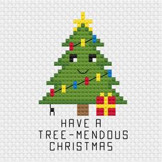 a cross stitch christmas tree with the words have a tree - mendous christmas written on it