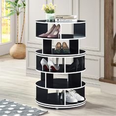 three tiered shoe rack with various pairs of shoes