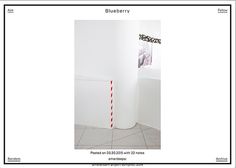 a white room with a red and white striped pole