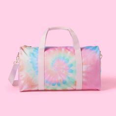 Lifestyle Brand Stoney Clover Lane Sparks Self-Expression Through Its Line Of Candy-Colored, Customizable Accessories. This Rainbow Tie-Dye Duffle Bag From Stoney Clover Lane X Target Will Help You Stay Organized In Style. Designed With Allover Rainbow Tie-Dye Print For A Fun, Colorful Look. The Spacious Main Compartment Offers Plenty Of Space For Storing All Of Your Essentials, And The Zipper Closure Ensures All Your Items Stay Secure. Plus, The Carrying Handle And Detachable Strap Allow You To Rectangular Tie-dye Bag For Daily Use, Daily Use Rectangular Tie Dye Bag, Daily Use Tie-dye Rectangular Bag, Everyday Pink Rectangular Duffle Bag, Trendy Pink Tote Duffle Bag, Trendy Pink Duffle Bag With Adjustable Strap, Trendy Pink Weekend Bag, Trendy Pink Duffle Bag For Daily Use, Casual Pink Duffle Bag With Adjustable Strap