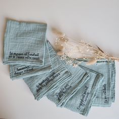 a bunch of tea towels sitting on top of a table