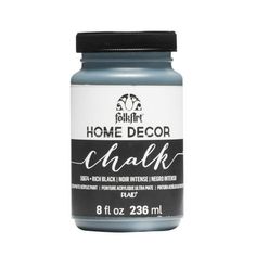 a bottle of chalk that is blue and white with the words home decor chalk on it